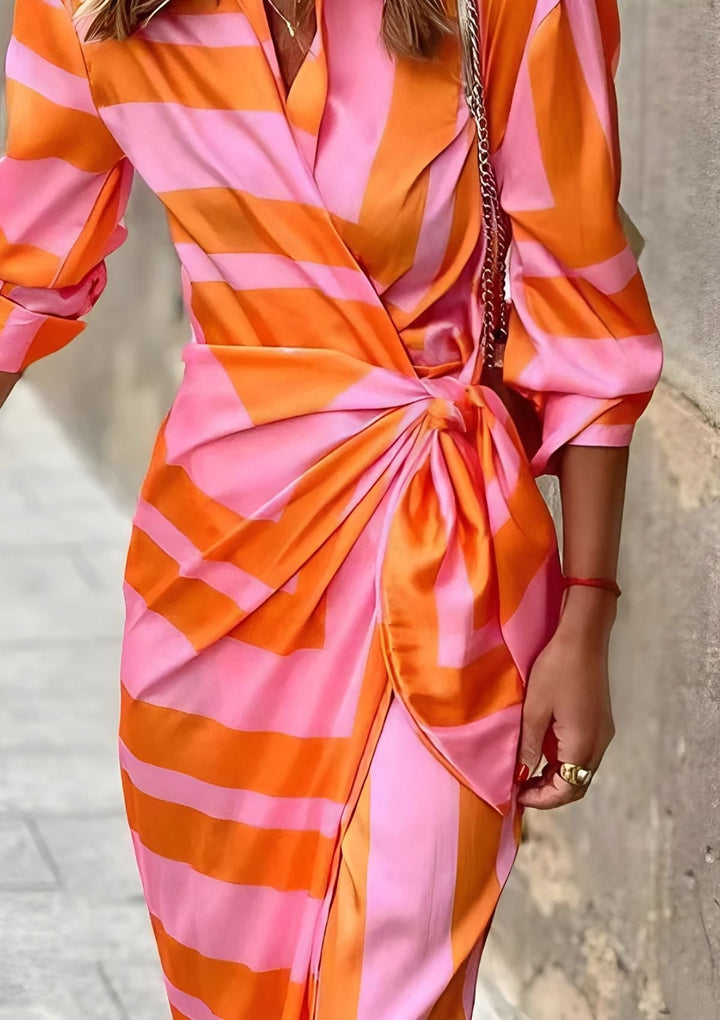 Abito midi donna stampato, elegante e aderente, un must-have per la moda femminile.