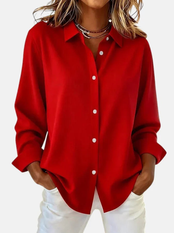 Top donna a maniche lunghe per autunno. Stile classico, comfort e moda, ideale per un look casual o ufficio.