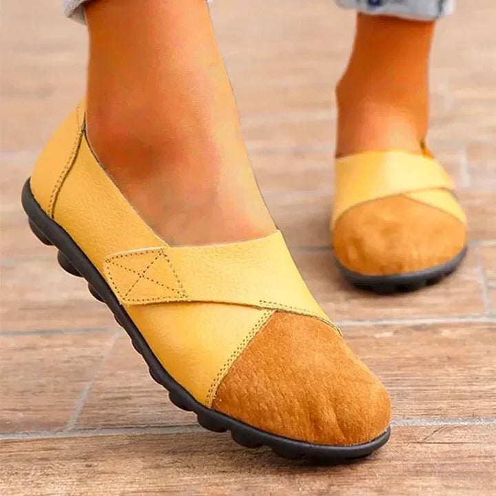 Mocassini donna in pelle con suola ergonomica e supporto plantare, perfetti per passeggio.