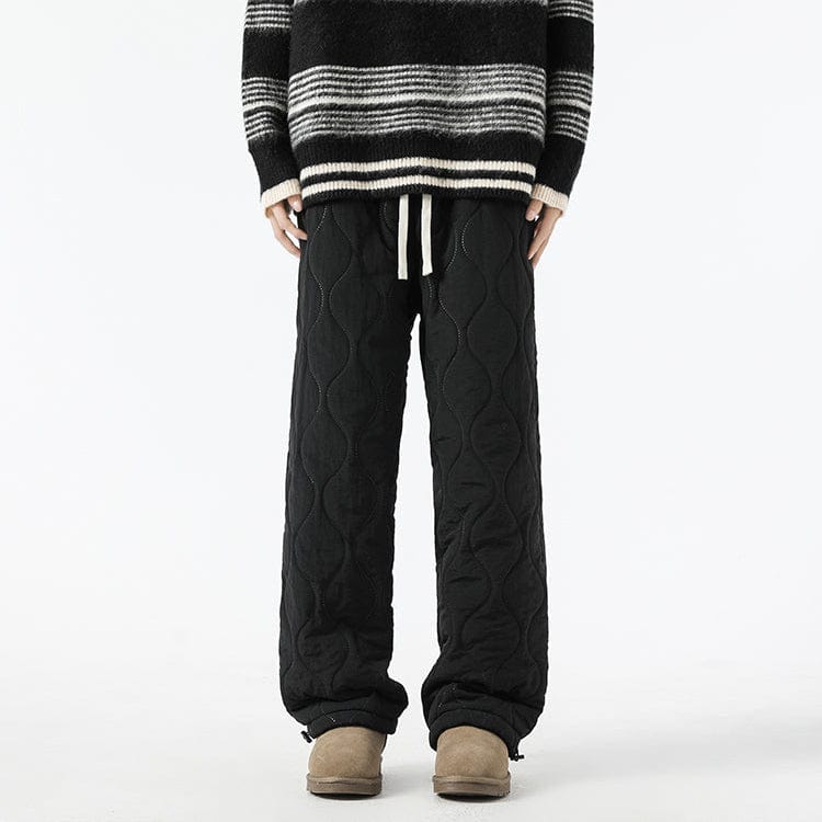 Design moderno: pantaloni invernali uomo trapuntati, larghi per un look casual-chic.