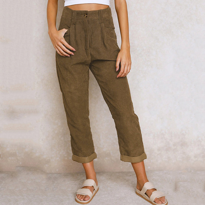 Pantaloni moda donna autunno-primavera: vita alta, a coste, gamba larga per massimo comfort e stile.