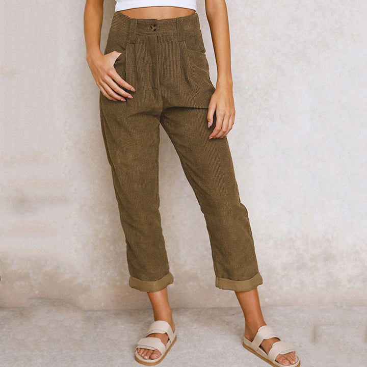 Pantaloni moda donna autunno-primavera: vita alta, a coste, gamba larga per massimo comfort e stile.