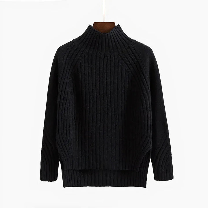 Maglione dolcevita femminile, capo indispensabile per moda autunno/inverno. Stile e calore assicurati.