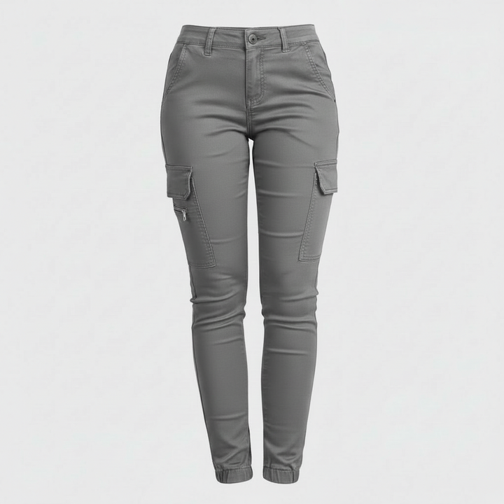 Pantaloni cargo verdi da donna, aderenti e con comode tasche laterali, perfetti per un look urbano e casual.