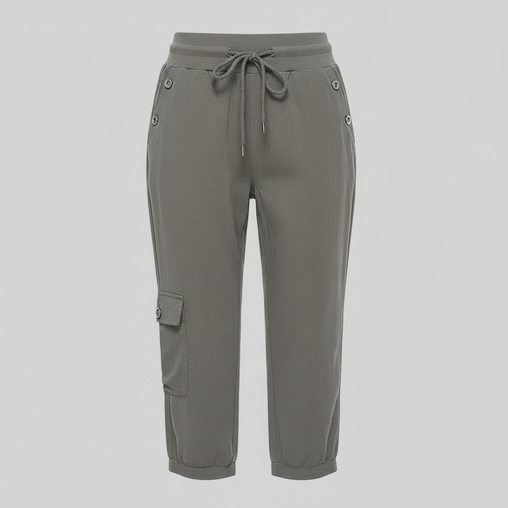 Pantaloni cargo donna casual verde scuro con tasche utili e coulisse per una vestibilità comoda e trendy.