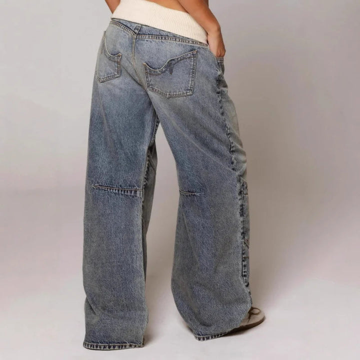 Jeans donna grigio chiaro, modello baggy a vita bassa con gamba larga. Stile street fashion, comodi e trendy.