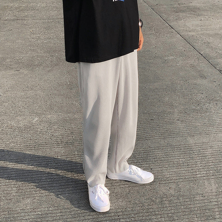Pantaloni uomo casual con vita elasticizzata e gamba dritta, offrendo comfort e uno stile moderno per ogni occasione.