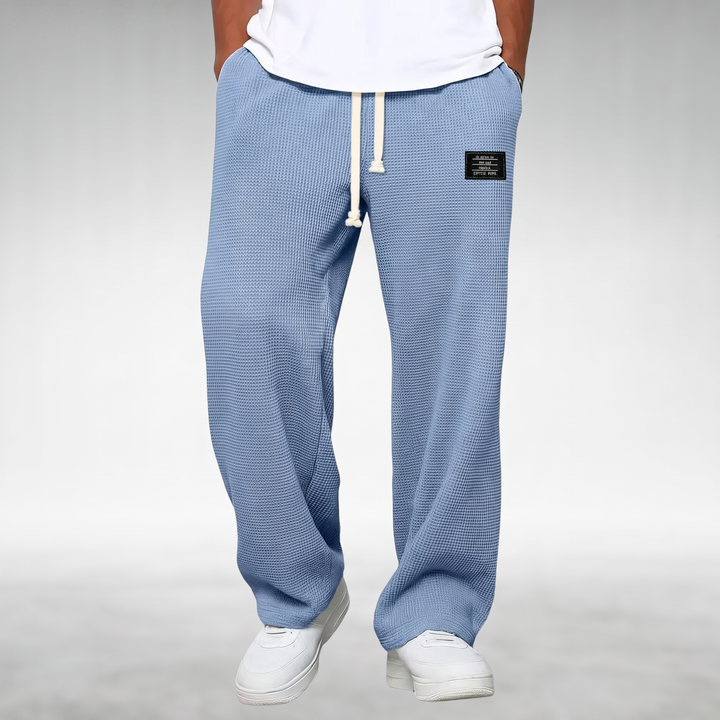 Pantaloni uomo casual con vita elastica per comfort quotidiano e stile versatile, ideali per relax e moda.