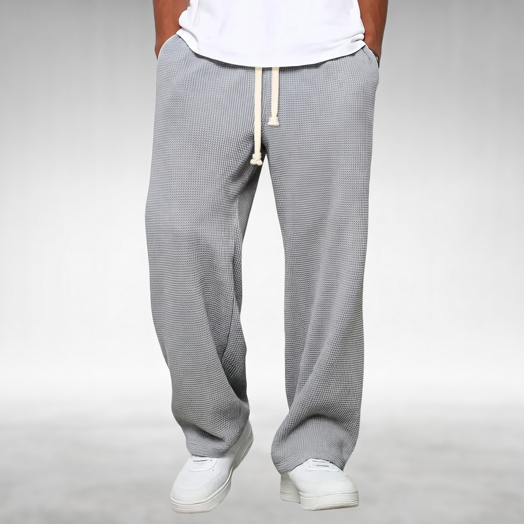 Pantaloni uomo comodi e dritti, con vita elastica, ideali per un abbigliamento casual e rilassato di qualità.