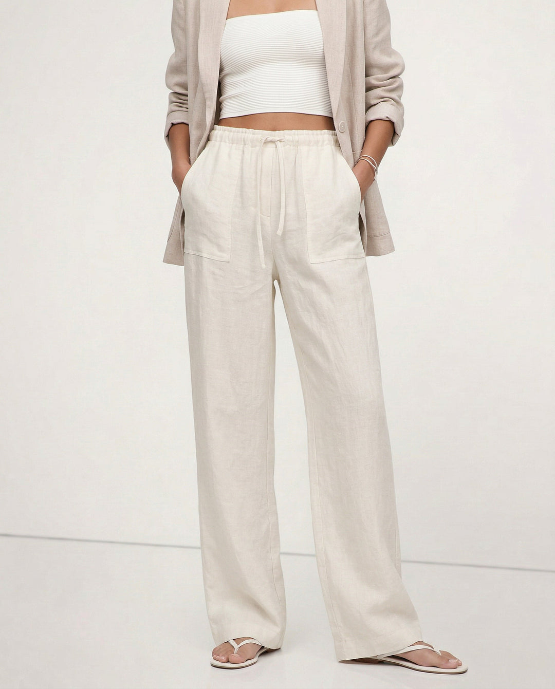 Pantaloni donna streetwear a gamba larga, con coulisse, ideali per un look estivo casual e alla moda.