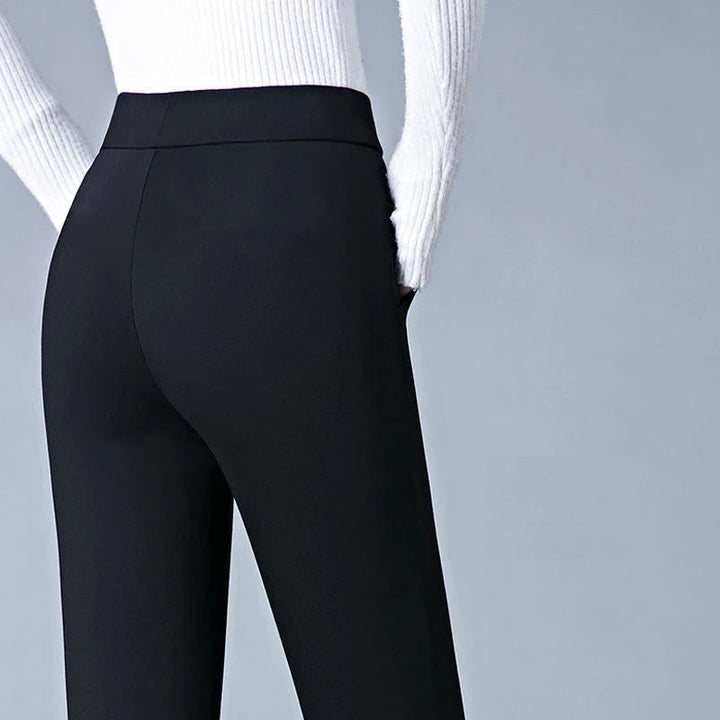 Pantaloni donna skinny a vita alta e righe, versatili per outfit casual o eleganti da lavoro.