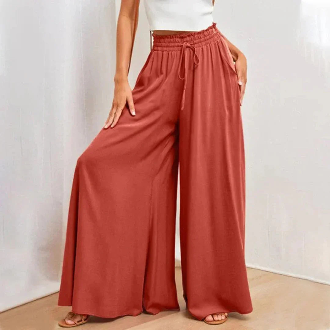 Pantaloni moderni da donna a vita alta, con ampia gamba larga per comfort e stile. Perfetti per ufficio o tempo libero.