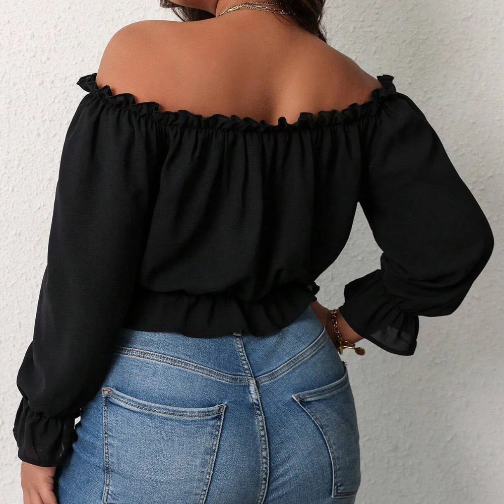 Top donna versatile a manica lunga, con design a spalle scoperte, ideale per outfit casual e autunnali.