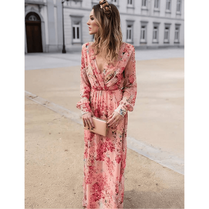 Elegante abito lungo da donna con stampa floreale bohémien, rosa. Stile fluido e romantico per un'estate chic.