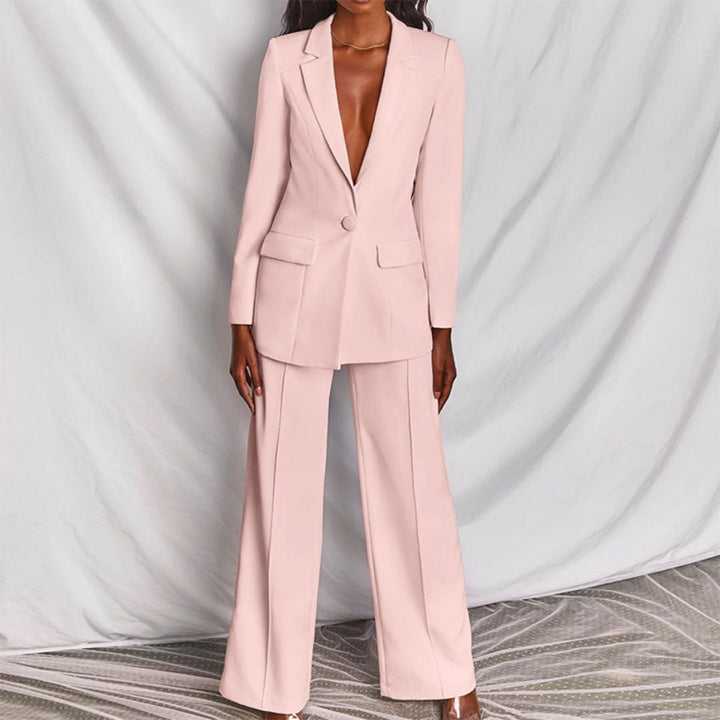 Completo donna elegante con blazer e pantaloni, vestibilità comoda per moda ufficio e meeting.