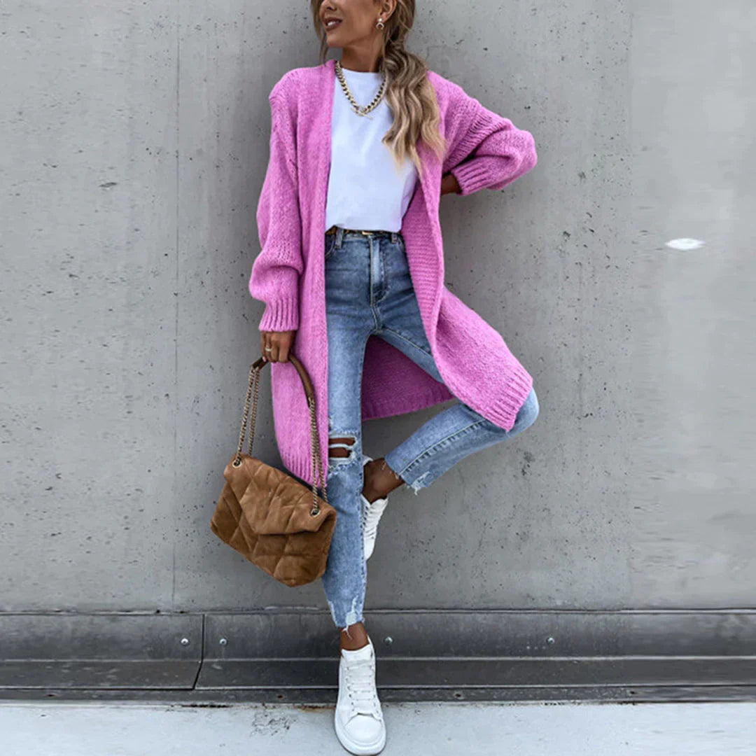 Elegante cardigan femminile, lungo e comodo, perfetto per sovrapposizioni.