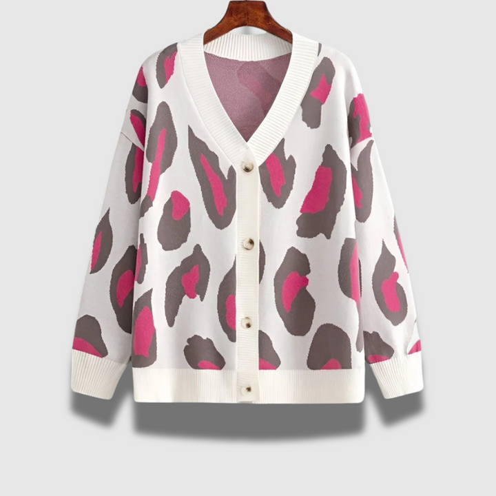 Elegante cardigan donna oversize in maglieria, scollo a V. Stile versatile per look casual chic.