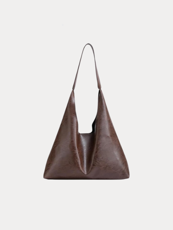 Borsa a tracolla donna in pelle con design raffinato, accessorio chic e funzionale per la vita quotidiana.