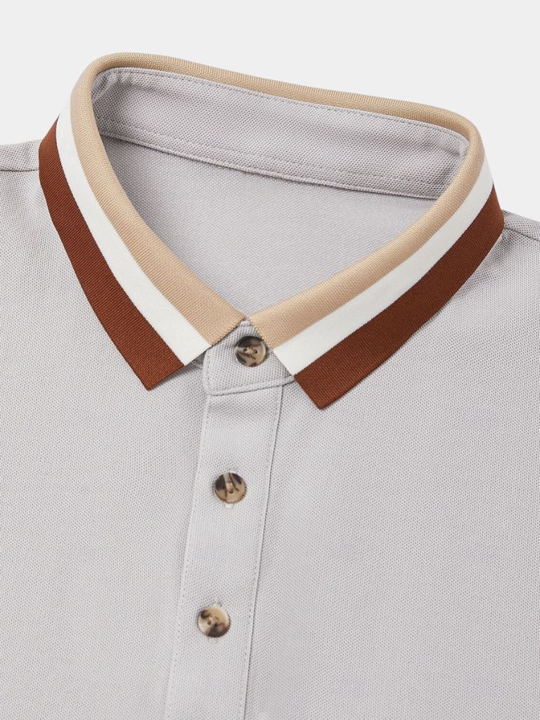 Polo uomo manica corta con distintivo colletto a contrasto. Vestibilità regolare per stile casual.