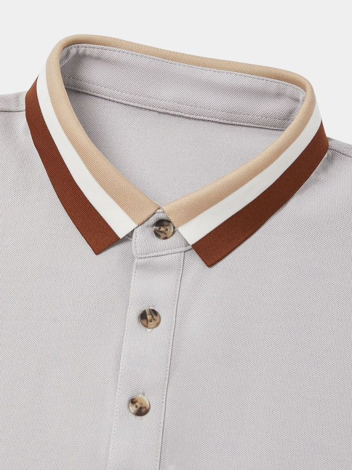 Polo uomo manica corta con distintivo colletto a contrasto. Vestibilità regolare per stile casual.