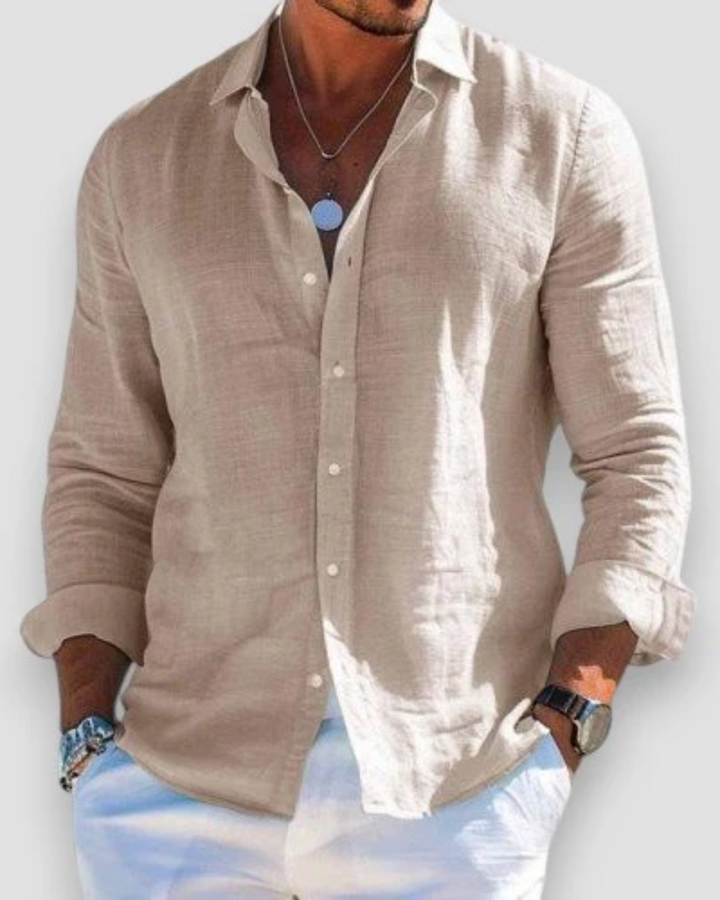 Camicia polo a maniche lunghe per uomo, taglio slim fit, colletto classico, ideale per un look moderno e chic.