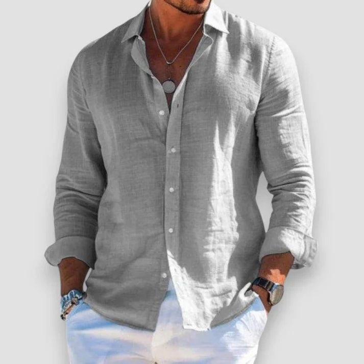 Polo uomo a maniche lunghe slim fit, colletto classico, look elegante casual chic, disponibile in vari colori.