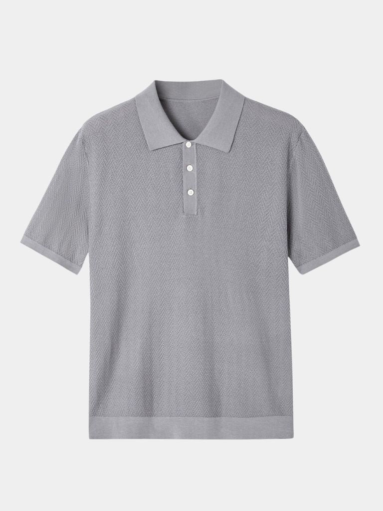 Polo elegante da uomo, ideale per un look raffinato. Motivo chevron distintivo.