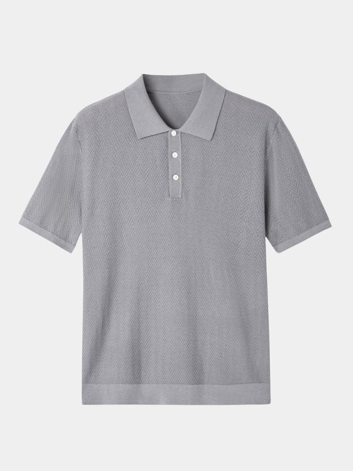 Polo elegante da uomo, ideale per un look raffinato. Motivo chevron distintivo.