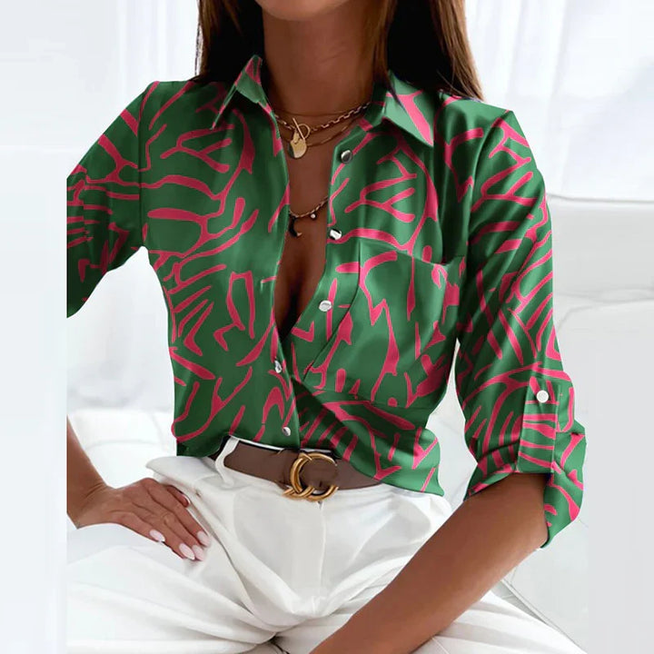 Blusa versatile e aderente con colletto per donna. Ideale per un look classico e moderno.