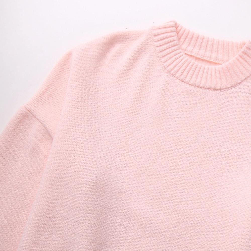 Pull rosa oversize scollo rotondo, abbigliamento donna elegante e comodo per la stagione fredda.