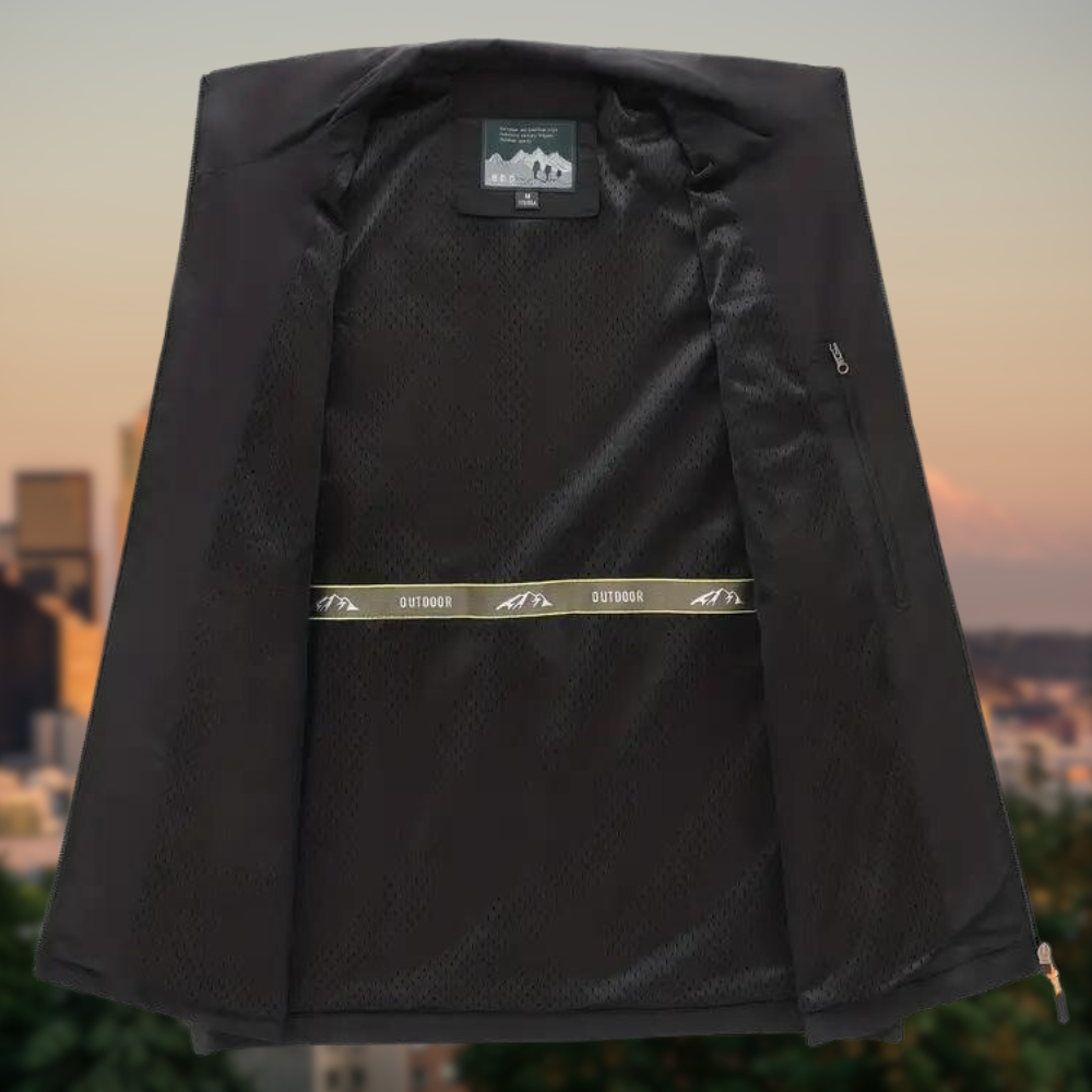 Gilet uomo nero senza maniche, con zip e tasche. Ideale per avventure outdoor e tempo libero.