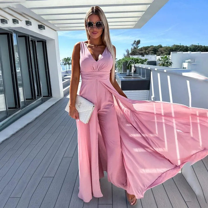 Jumpsuit femminile rosa a gamba larga, con vita aderente. Moda versatile per outfit primavera/estate, comfort assicurato.