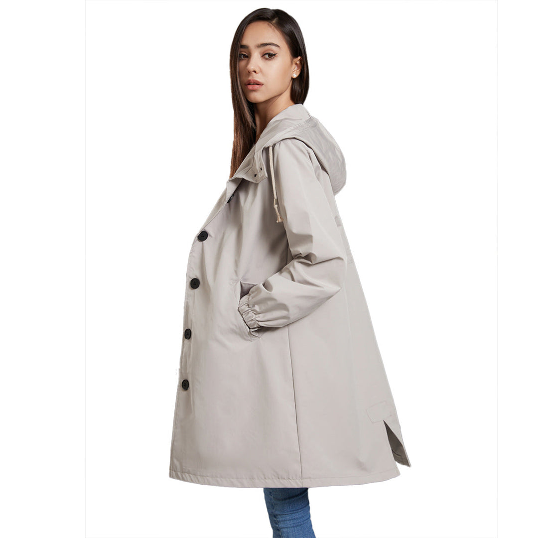 Giacca con cappuccio e bottoni, cappotto lungo donna per un look casual-elegante moda inverno.