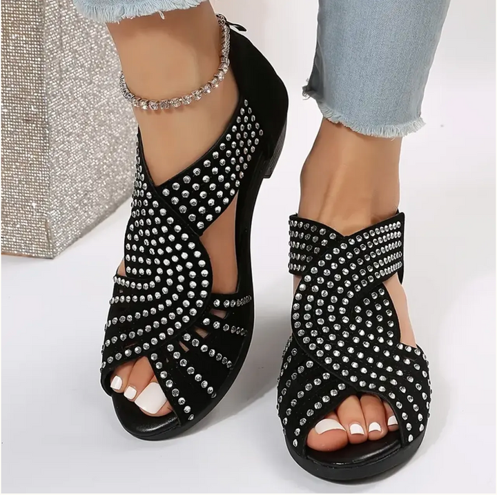 Sandali estivi donna neri con supporto plantare e tacco basso. Ideali per passeggio e comfort casual.