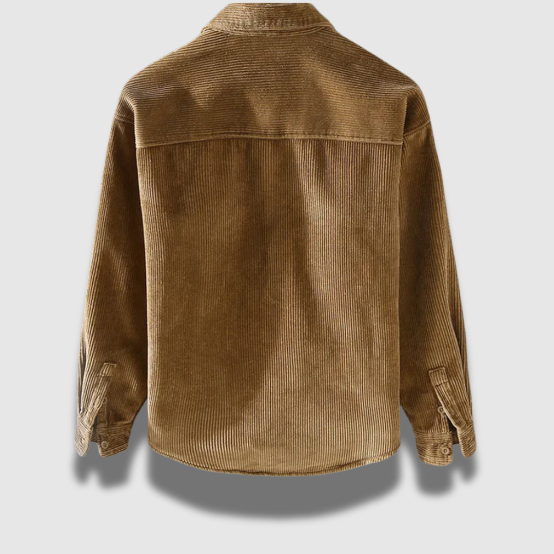 Dettaglio giacca uomo a coste, stile classico senza tempo. Moda maschile autunno/inverno, capo elegante.