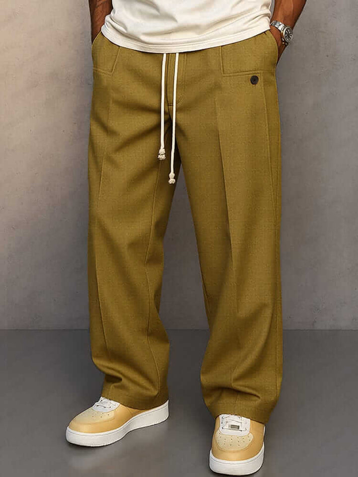 Pantaloni larghi da uomo in tessuto comodo con coulisse e tasche laterali. Perfetti per look casual.