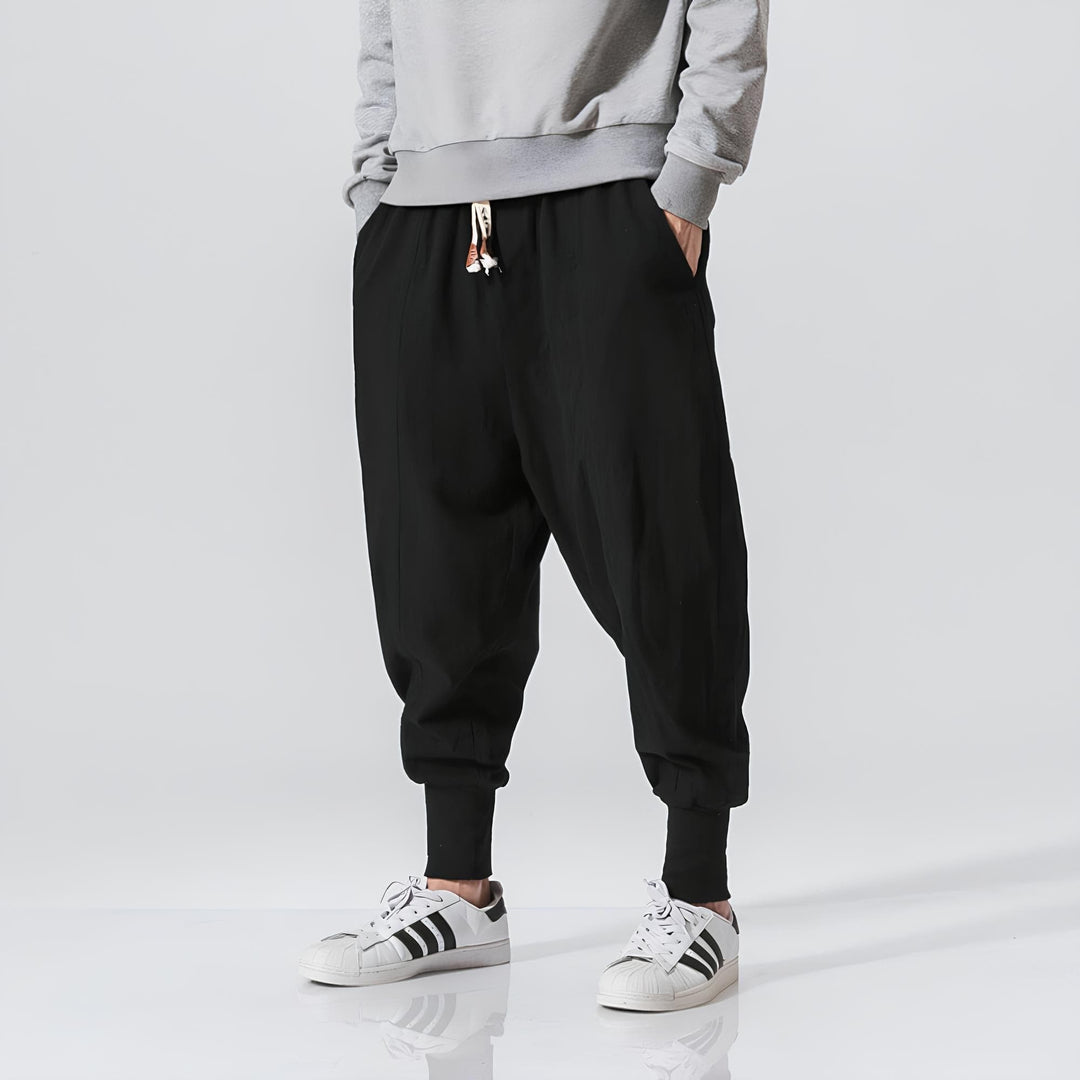 Pantaloni casual da uomo con design a cavallo basso, vita regolabile e tessuto confortevole per un look unico.