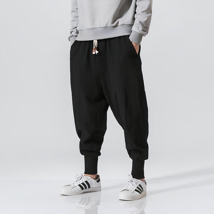 Pantaloni casual da uomo con design a cavallo basso, vita regolabile e tessuto confortevole per un look unico.