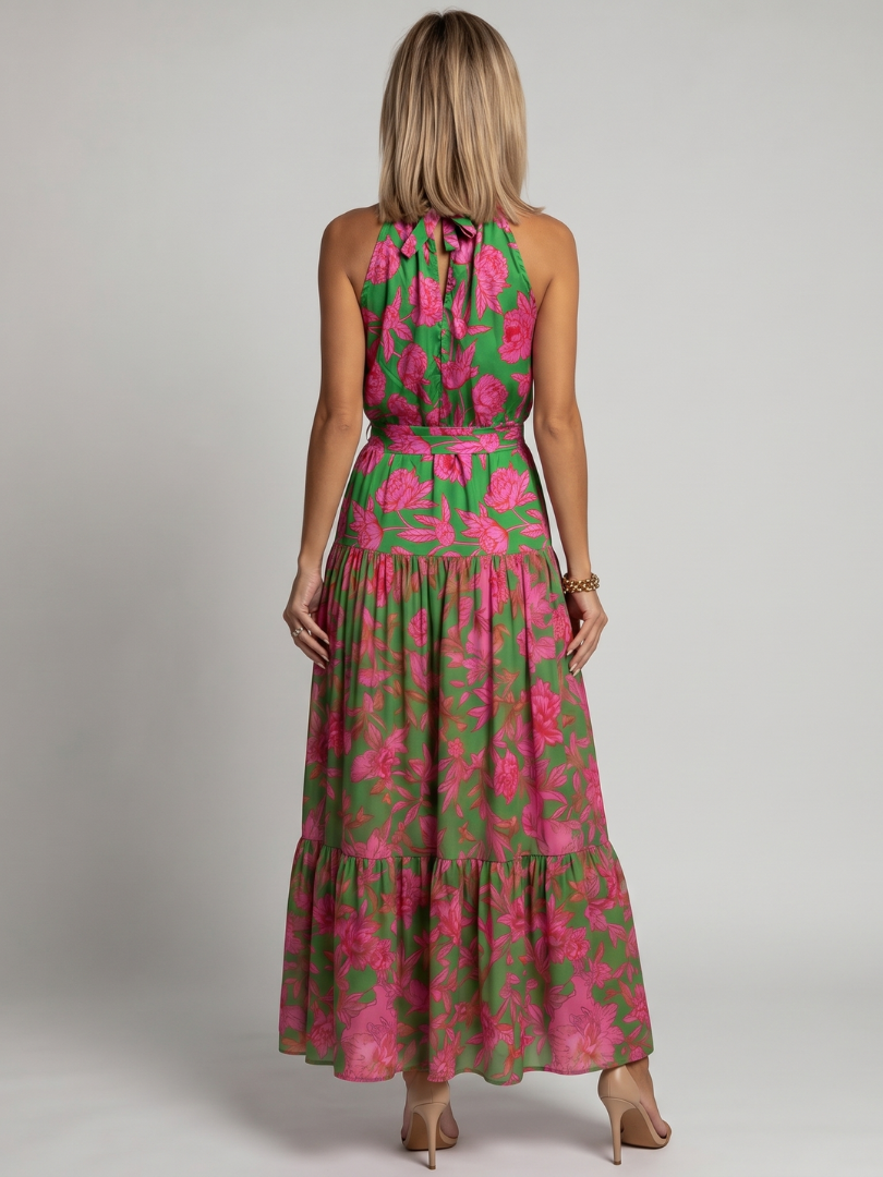 Abito midi floreale drappeggiato da donna con collo halter. Vestito estivo elegante e chic, ideale per un look femminile.