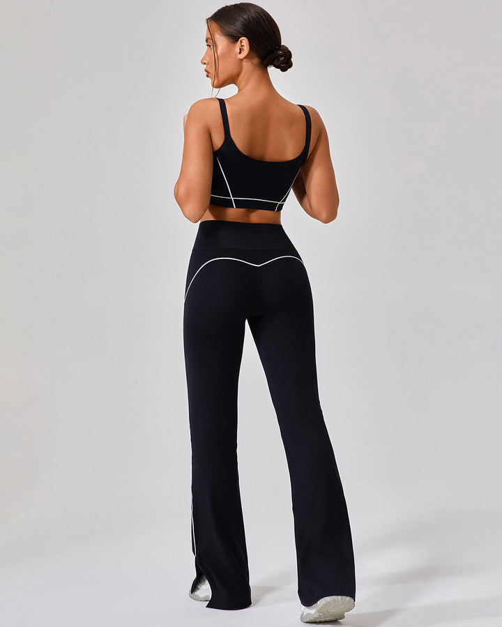 Leggings donna svasati vita alta con spacco e piping, versatili per fitness o look casual alla moda.