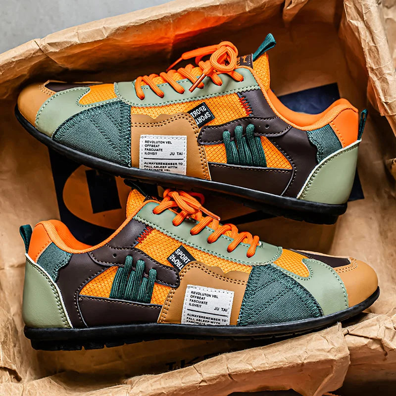 Sneakers uomo rétro multicolore per stile quotidiano. Design sportivo con lacci.
