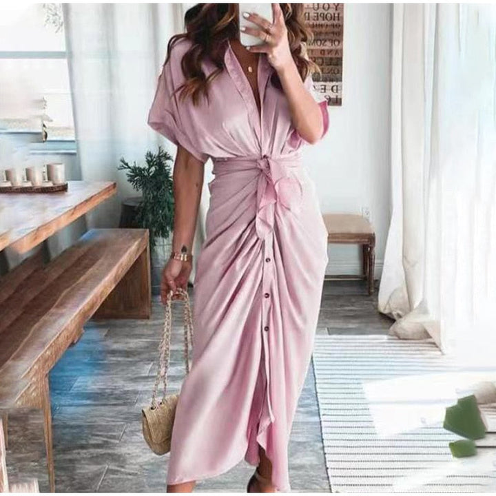 Abito lungo femminile, con bottoni, vestibilità comoda, stile estivo elegante.