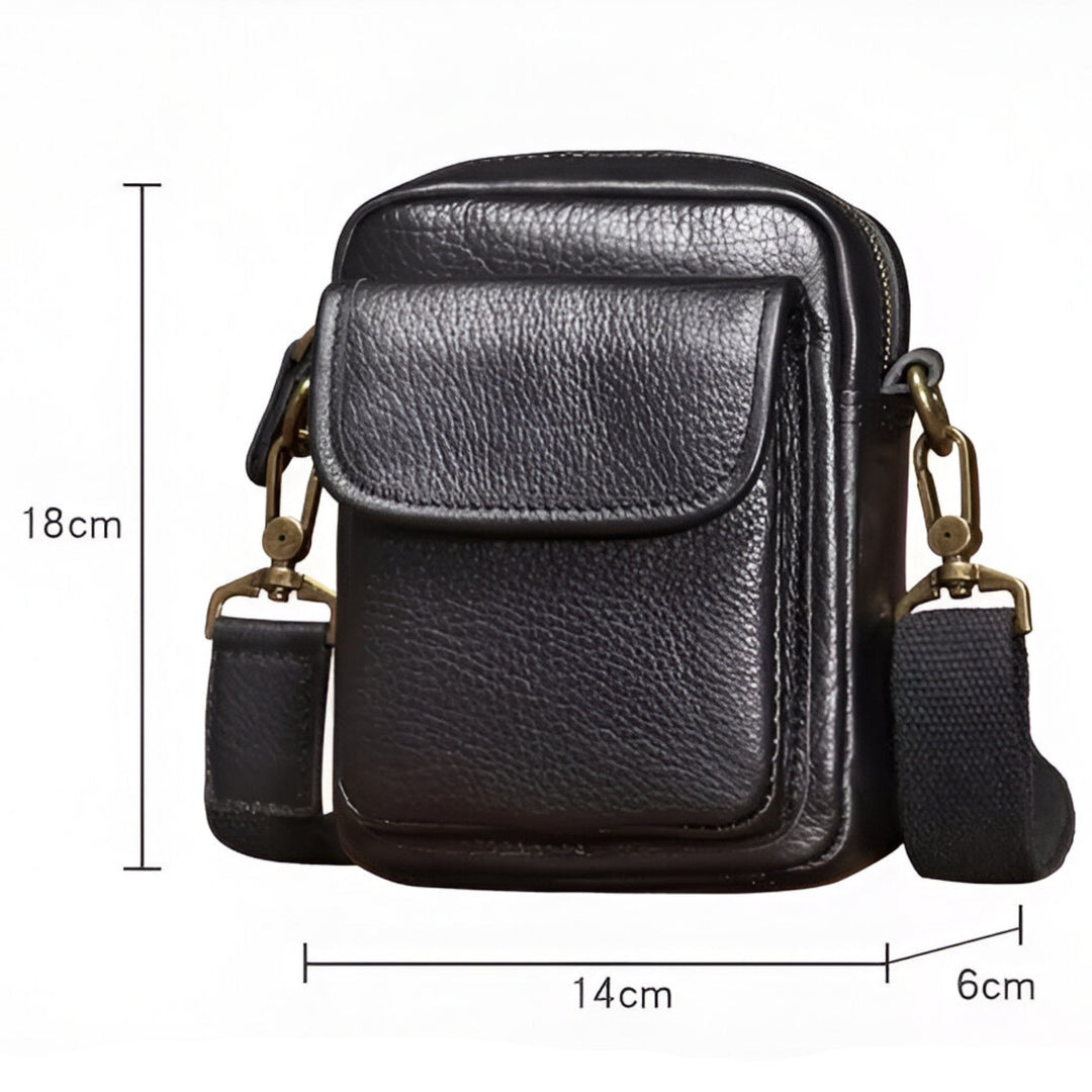 Borsa a tracolla uomo, colore nero, compatta e essenziale per portare gli oggetti quotidiani con stile.