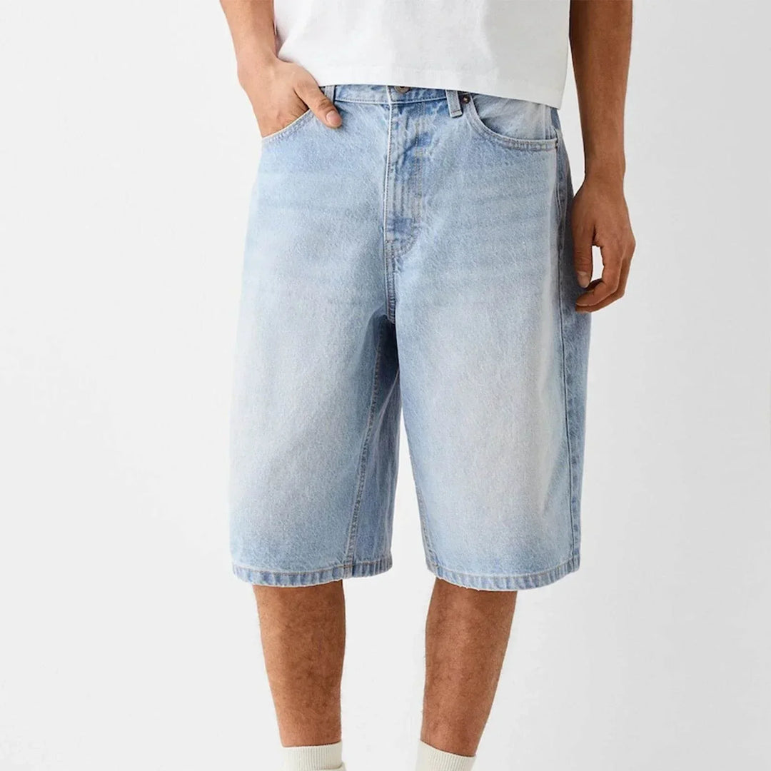 Shorts bermuda uomo casual baggy, vestibilità relax sotto il ginocchio. Ideale per moda estiva streetwear.