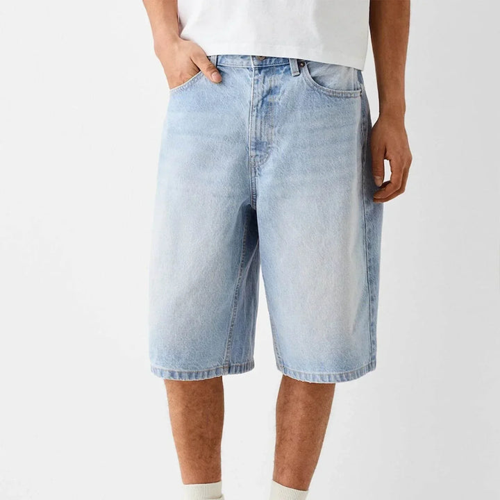 Shorts bermuda uomo casual baggy, vestibilità relax sotto il ginocchio. Ideale per moda estiva streetwear.