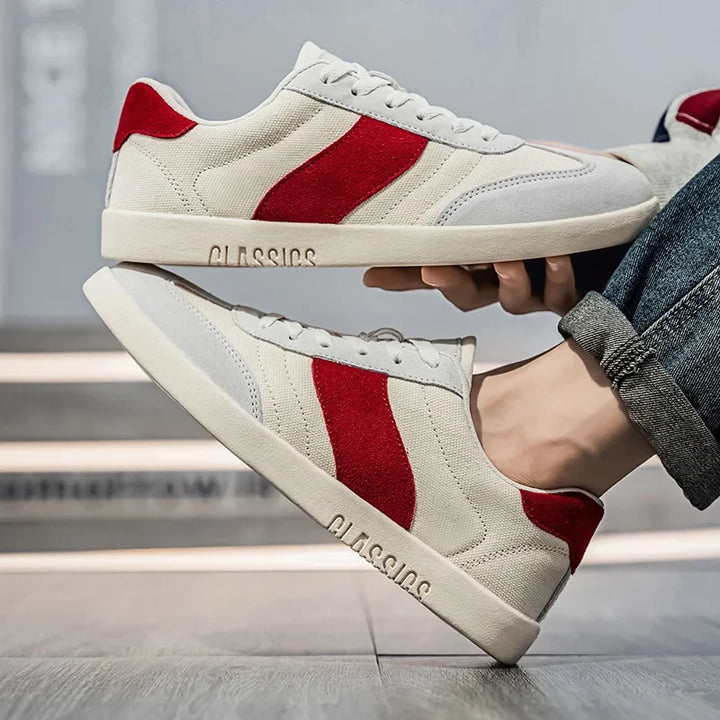 Scarpe sneakers uomo frontale, design pulito e comode per uno stile versatile e leggero.