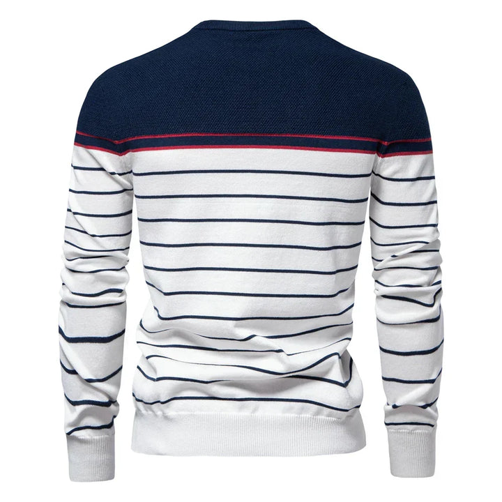 Maglione uomo a righe, dal design elegante con bordi a coste. Ideale per un look autunnale-invernale di tendenza.