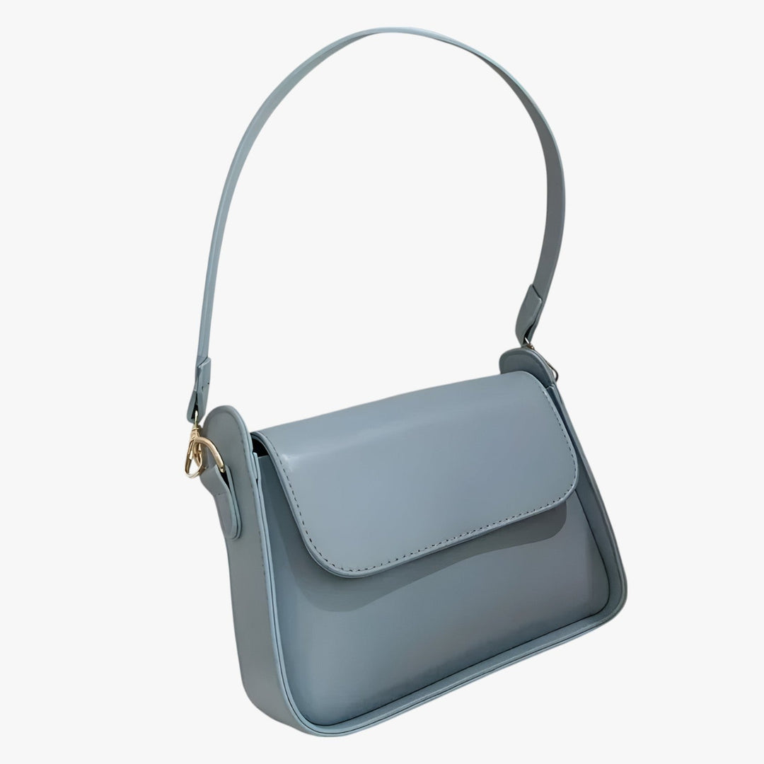 Elegante borsa a tracolla bianca da donna, compatta e versatile per ogni outfit.