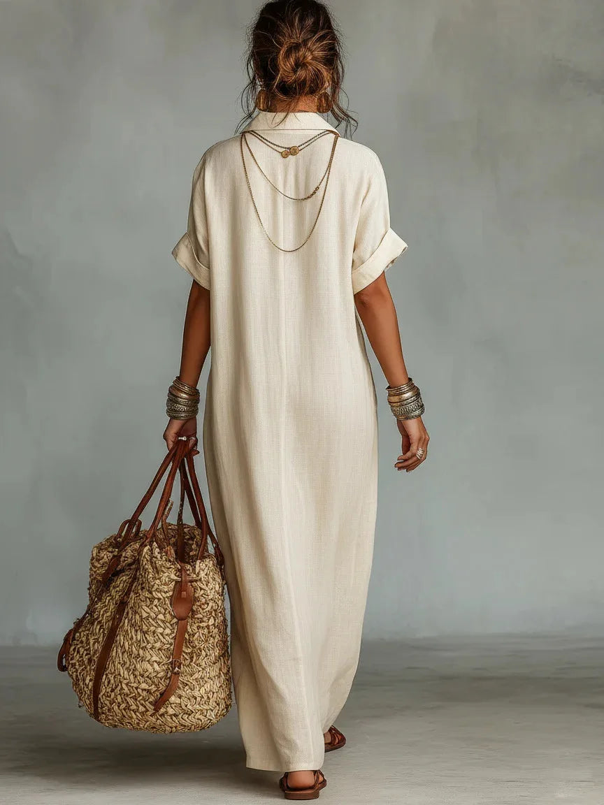 Abito lungo donna boho con comode tasche e ricamo. Veste fluida, ideale per un look casual estivo.
