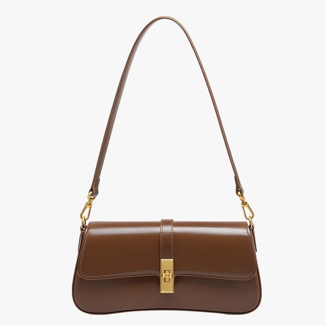 Accessorio moda donna: borsa baguette rosso vino, chic e compatta per ogni occasione.